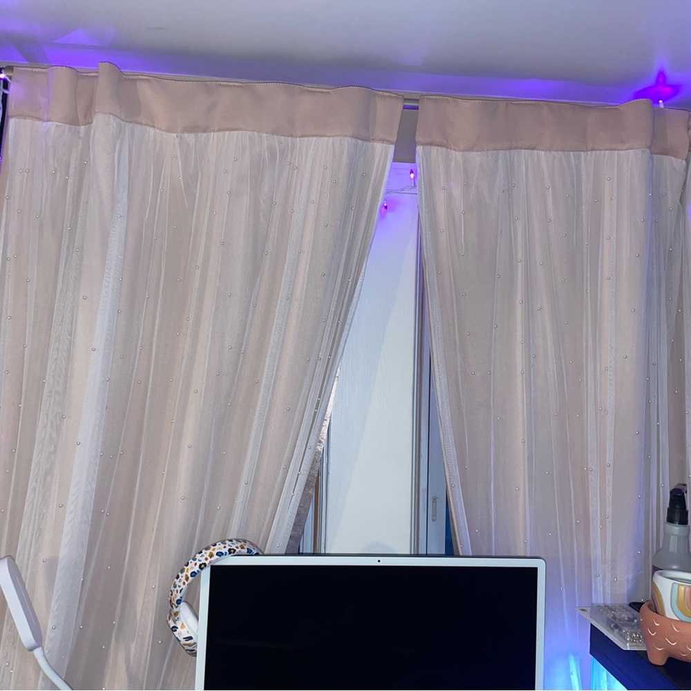 Light pink blackout curtains with sheer layer on top and pearls to sparkle!